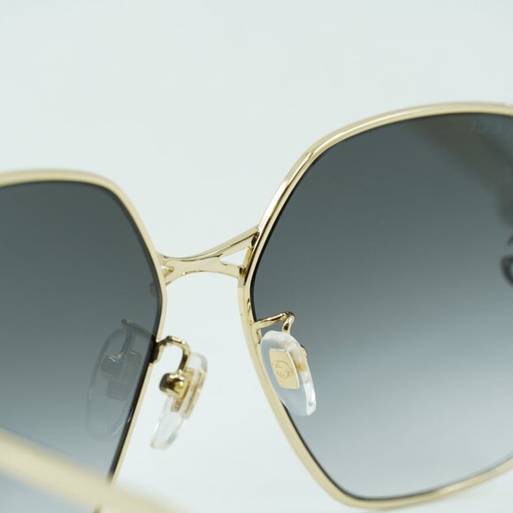 Gucci GG0818SA 005 Sunglasses Gold Geometric Frame, Grey Lenses main image 6